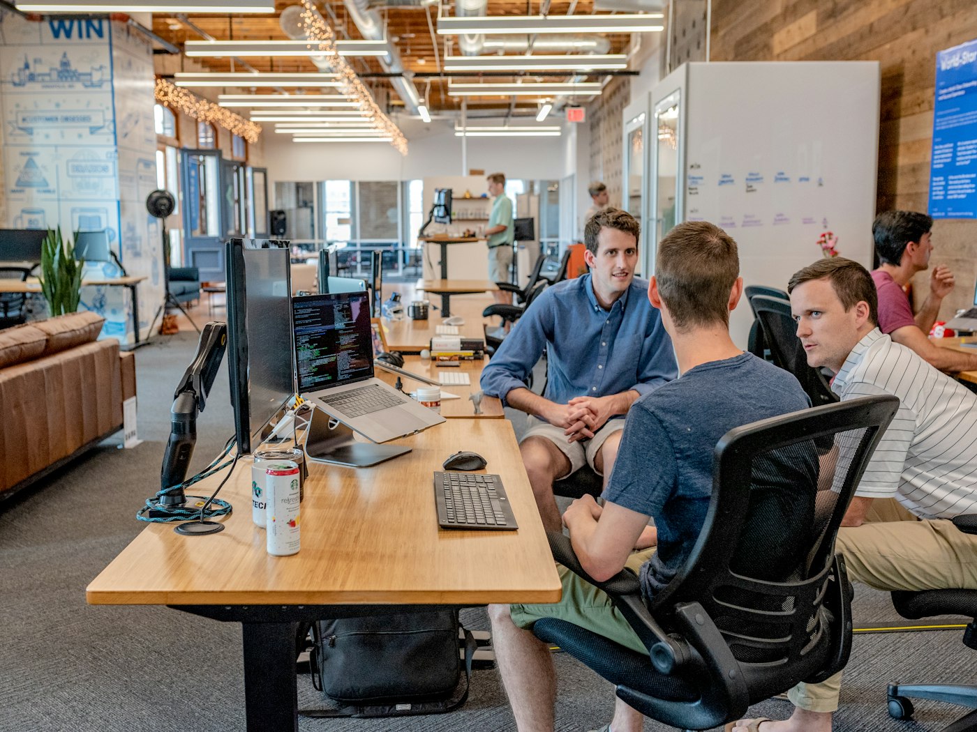 Diverse team members in an open discussion about workplace culture